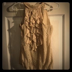 Cream sleeveless blouse